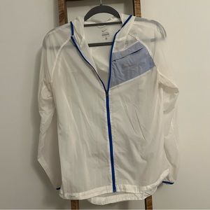 Nike ultra light jacket, women’s size medium, white.